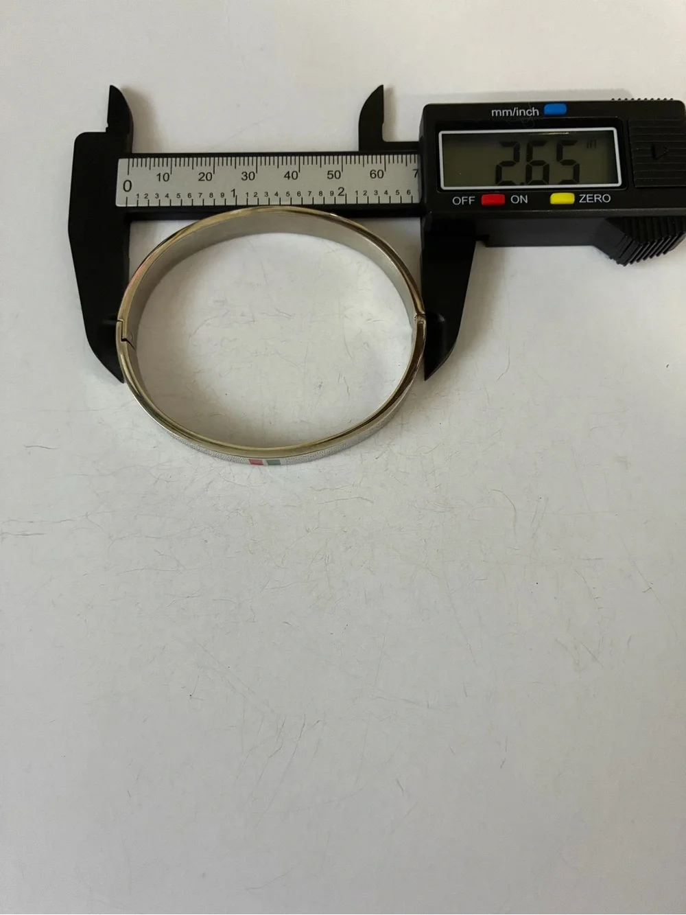 Luxury Silver Bangle Bracelet with Red and Green Accents